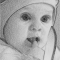 A baby with a knife