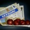 newspaper with apples